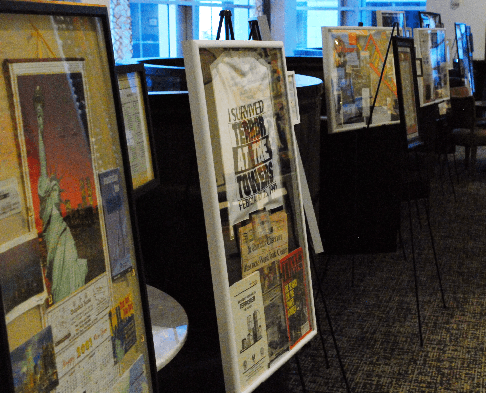 WTC history show display with memorabilia and artwork