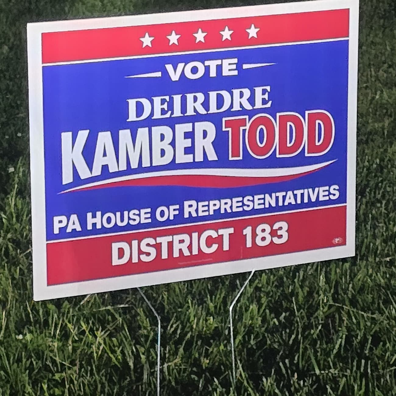 Deirdre Kamber Todd campaign yard sign in red, white, and blue with no party affiliation